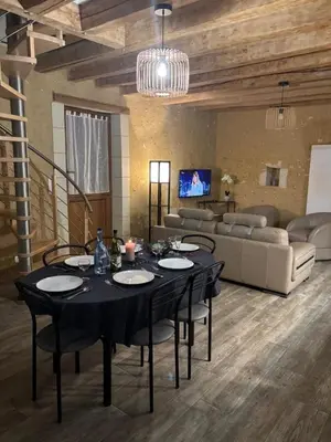Coin salon dans l'établissement Maison de campagne idéale pour 6 personnes