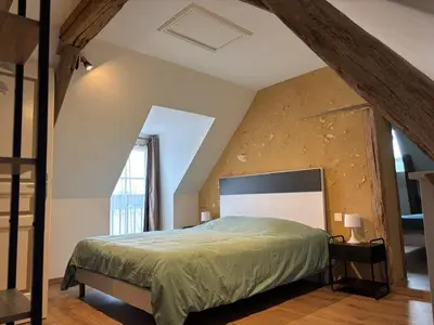 Un ou plusieurs lits dans un hébergement de l'établissement Maison de campagne idéale pour 6 personnes