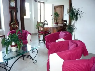 Coin salon dans l'établissement Chambres D'hôtes Anne-Marie