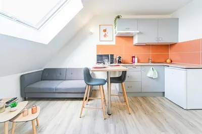 Cuisine ou kitchenette dans l'établissement Le Grand Anatole - Proche Gare - Netflix