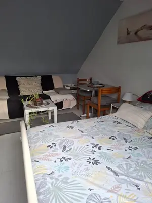 Un ou plusieurs lits dans un hébergement de l'établissement Chambre à l étage chez un particulier