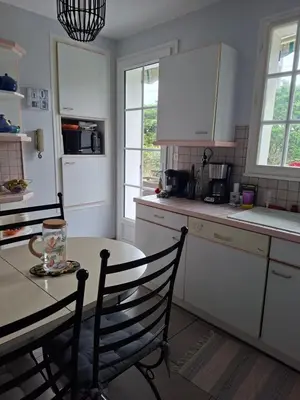 Cuisine ou kitchenette dans l'établissement Chambre à l étage chez un particulier