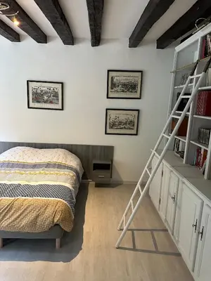 Un ou plusieurs lits dans un hébergement de l'établissement Maison de campagne