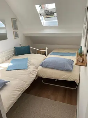 Un ou plusieurs lits dans un hébergement de l'établissement Sunshine cottages