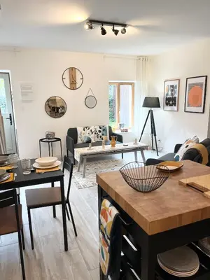 Coin salon dans l'établissement Sunshine cottages