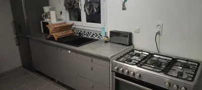 Cuisine ou kitchenette dans l'établissement Studio Paisible