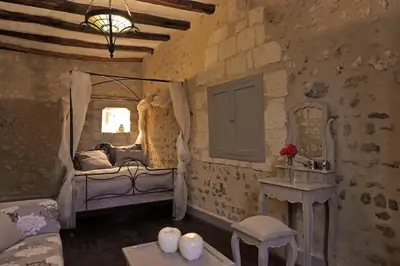 Un ou plusieurs lits dans un hébergement de l'établissement Ancien presbytère en bord de rivière proche vallée de la Loire