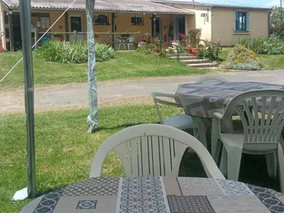 Jardin de l'établissement Mobil-home PMR 28m², 4 pers, Terrasse - API-1-52-1728