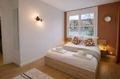 Un ou plusieurs lits dans un hébergement de l'établissement Appartement hyper Centre Rénové Terrasse & Parking