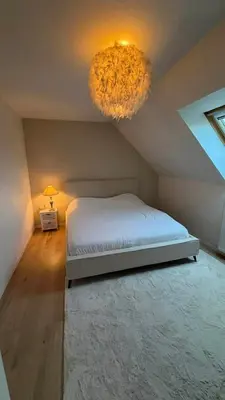 Un ou plusieurs lits dans un hébergement de l'établissement Maison de campagne - 20min du circuit des 24H et du zoo de la Flèche