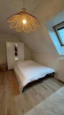 Un ou plusieurs lits dans un hébergement de l'établissement Maison de campagne - 20min du circuit des 24H et du zoo de la Flèche