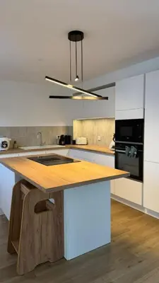 Cuisine ou kitchenette dans l'établissement Maison de campagne - 20min du circuit des 24H et du zoo de la Flèche