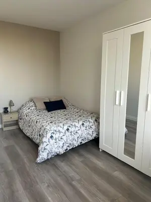Un ou plusieurs lits dans un hébergement de l'établissement Spacieux confortable et facile d'accès - 3 chambres