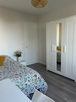 Un ou plusieurs lits dans un hébergement de l'établissement Spacieux confortable et facile d'accès - 3 chambres