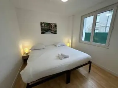 Un ou plusieurs lits dans un hébergement de l'établissement Appartement avec terrasse au centre de St Cyr