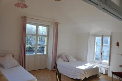 Un ou plusieurs lits dans un hébergement de l'établissement Gite LE BALCON