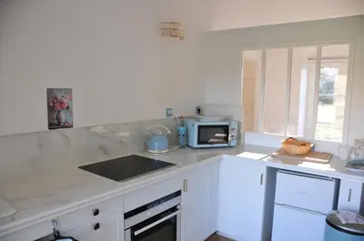 Cuisine ou kitchenette dans l'établissement Gite LE BALCON