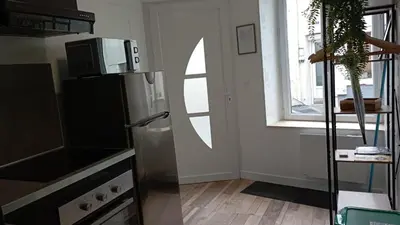 Cuisine ou kitchenette dans l'établissement Au 24 a connerre