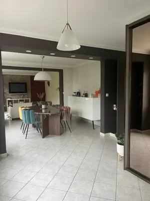 Cuisine ou kitchenette dans l'établissement Maison proche circuit 24h Le Mans