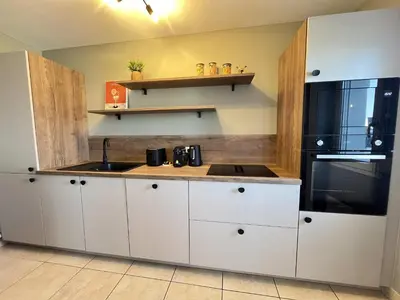 Cuisine ou kitchenette dans l'établissement L'Orée du Mail - Jaurès - Balcon - 6p