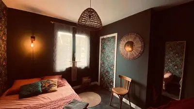 Un ou plusieurs lits dans un hébergement de l'établissement Location chambre 24H du Mans