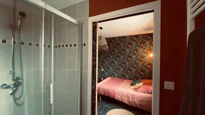 Un ou plusieurs lits dans un hébergement de l'établissement Location chambre 24H du Mans