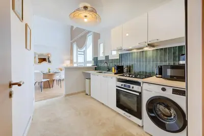 Cuisine ou kitchenette dans l'établissement Loft au coeur des halles -parking privé - Wifi
