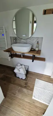 Salle de bains dans l'établissement Gite la Berlotte