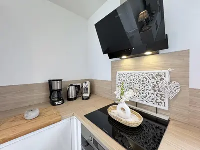 Cuisine ou kitchenette dans l'établissement Dépendance de Charme - Ruaudin - 5 pers