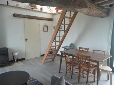 Coin salon dans l'établissement La Bergerie du Buisson