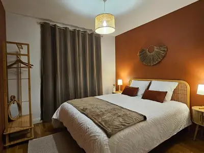 Un ou plusieurs lits dans un hébergement de l'établissement La fleur des eaux de Beauval