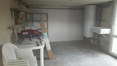 Coin salon dans l'établissement Maison avec jardin et garage