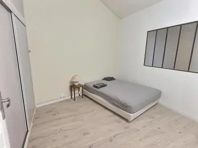 Un ou plusieurs lits dans un hébergement de l'établissement Charming home 12