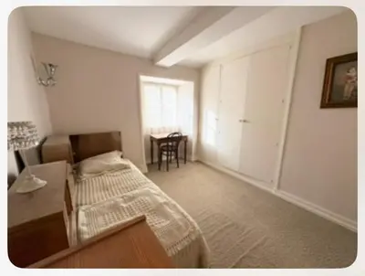 Un ou plusieurs lits dans un hébergement de l'établissement Charming home 12