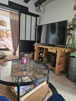 Télévision ou salle de divertissement dans l'établissement Maison du bonheur