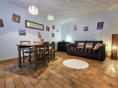 Coin salon dans l'établissement La Petite Reinette 2 - 4pers - charme - Wifi