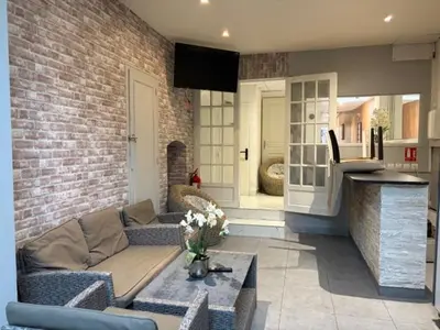 Cuisine ou kitchenette dans l'établissement Hôtel Le Normandie