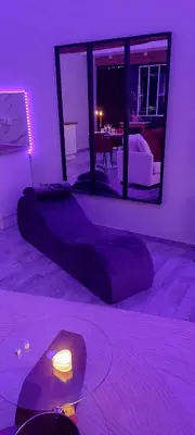 Un ou plusieurs lits dans un hébergement de l'établissement Love et Sens - Love room avec jacuzzi