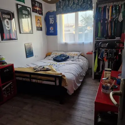 Un ou plusieurs lits dans un hébergement de l'établissement Chambre circuit 24h 900m du virage de Mulsanne
