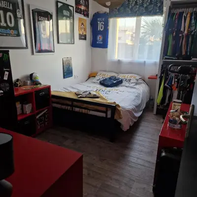 Un ou plusieurs lits dans un hébergement de l'établissement Chambre circuit 24h 900m du virage de Mulsanne