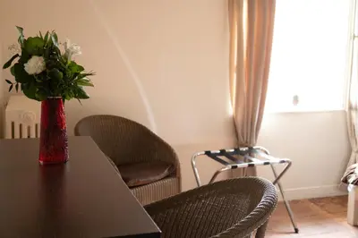 Coin salon dans l'établissement Le clos aux roses