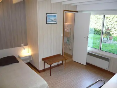Un ou plusieurs lits dans un hébergement de l'établissement Guest House La Fauvelaie