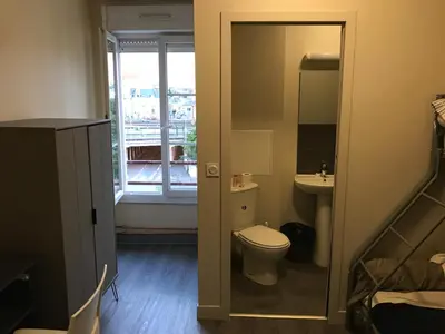 Salle de bains dans l'établissement Le Sporting