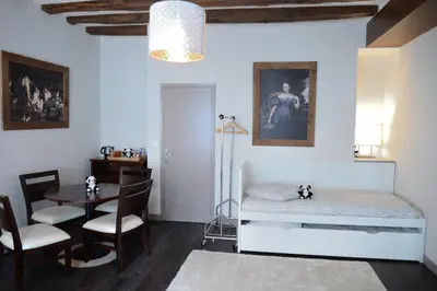 Un ou plusieurs lits dans un hébergement de l'établissement Maison du chatelain