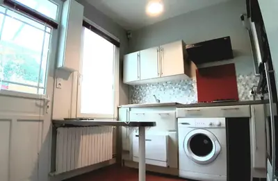 Cuisine ou kitchenette dans l'établissement La Glacière - chambre avec salle de bain - 2 personnes