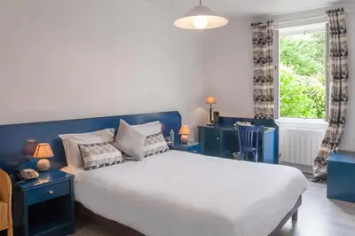Un ou plusieurs lits dans un hébergement de l'établissement Hôtel Saint Jacques