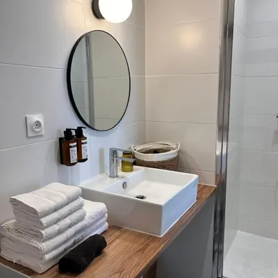 Salle de bains dans l'établissement Hôtel Rive Sud