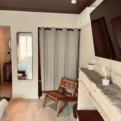 Coin salon dans l'établissement Hôtel Rive Sud