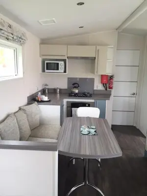 Cuisine ou kitchenette dans l'établissement Dugny-Mobil home