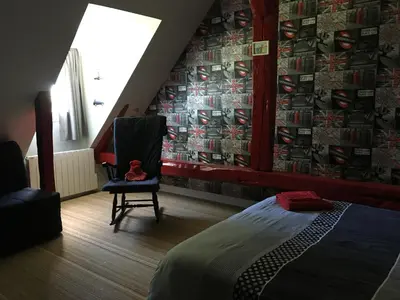 Un ou plusieurs lits dans un hébergement de l'établissement Fleur House